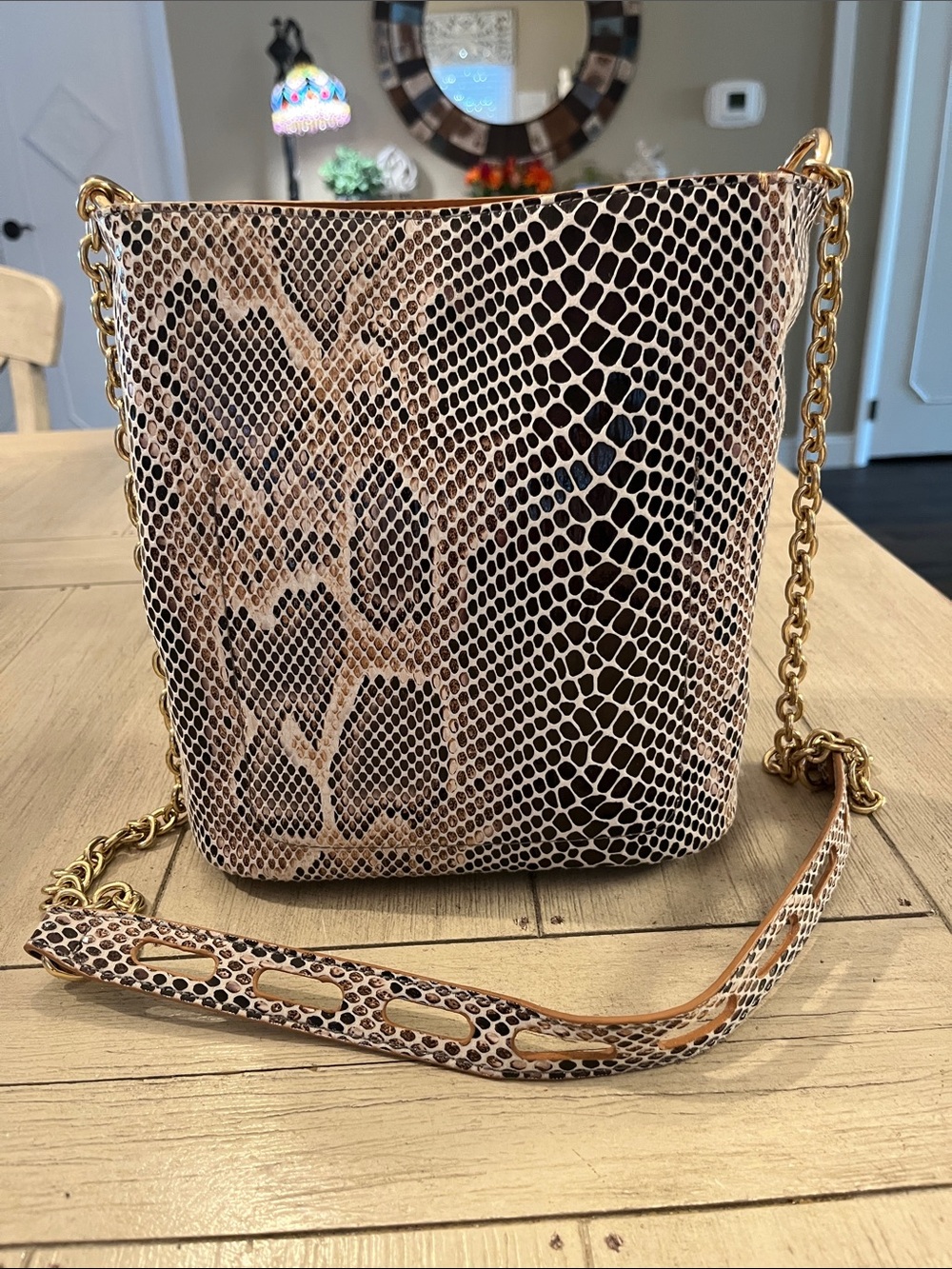 Sondra Roberts Snake-Print Bucket Crossbody in Brown and Cream with Gold Chain